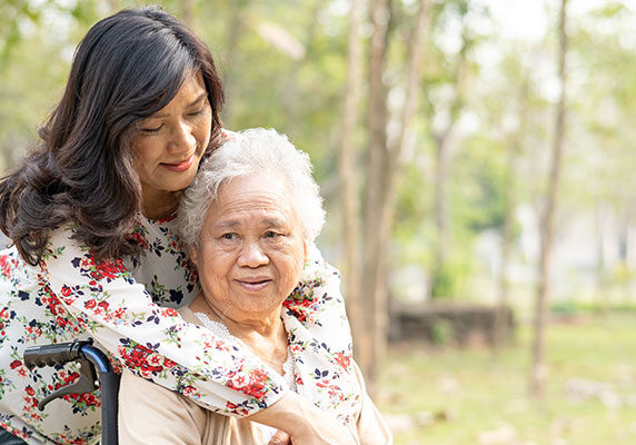 MZFwithMominWheelchair_AdobeStock_382182485_700x400